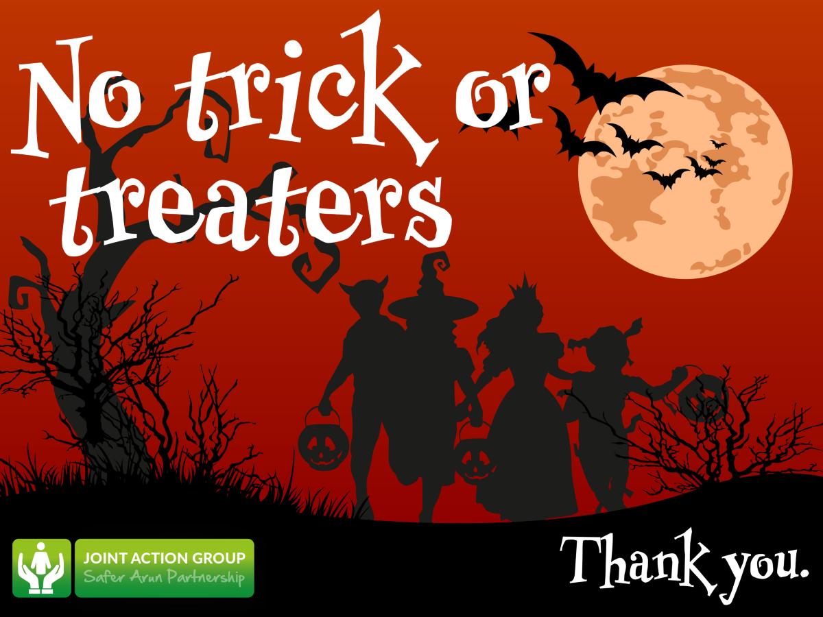 'No trick or treaters' poster